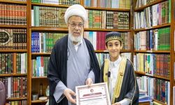 العتبة العباسية تكرمُ طالباً خطف المركز الأول بقراءة القران في روسيا